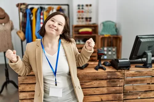 Young,Down,Syndrome,Woman,Working,As,Manager,At,Retail,Boutique